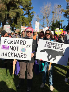 Middle Gila Women holding protest signs at a rally