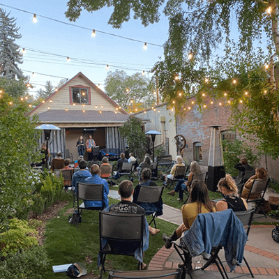 People sitting down at a fundraising event