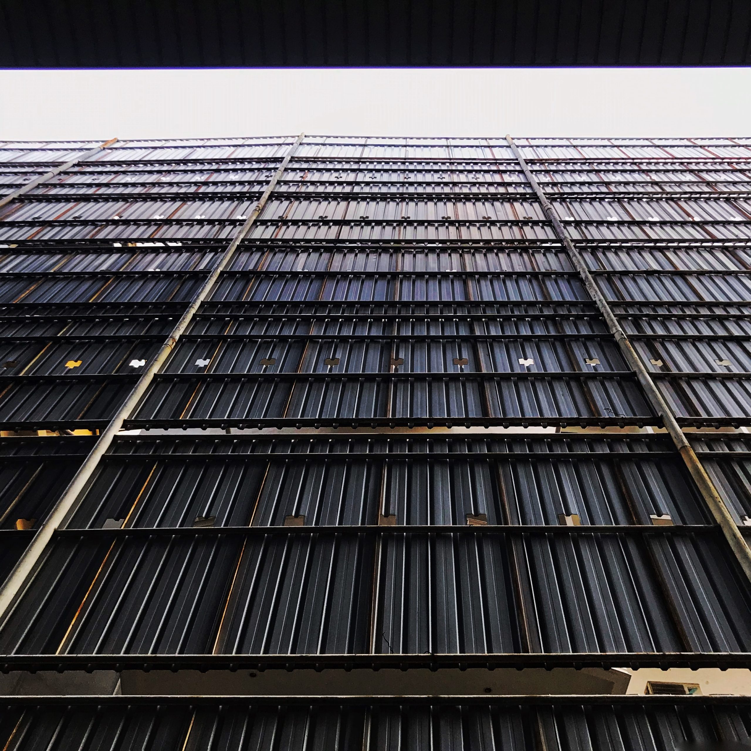 looking up at the border wall